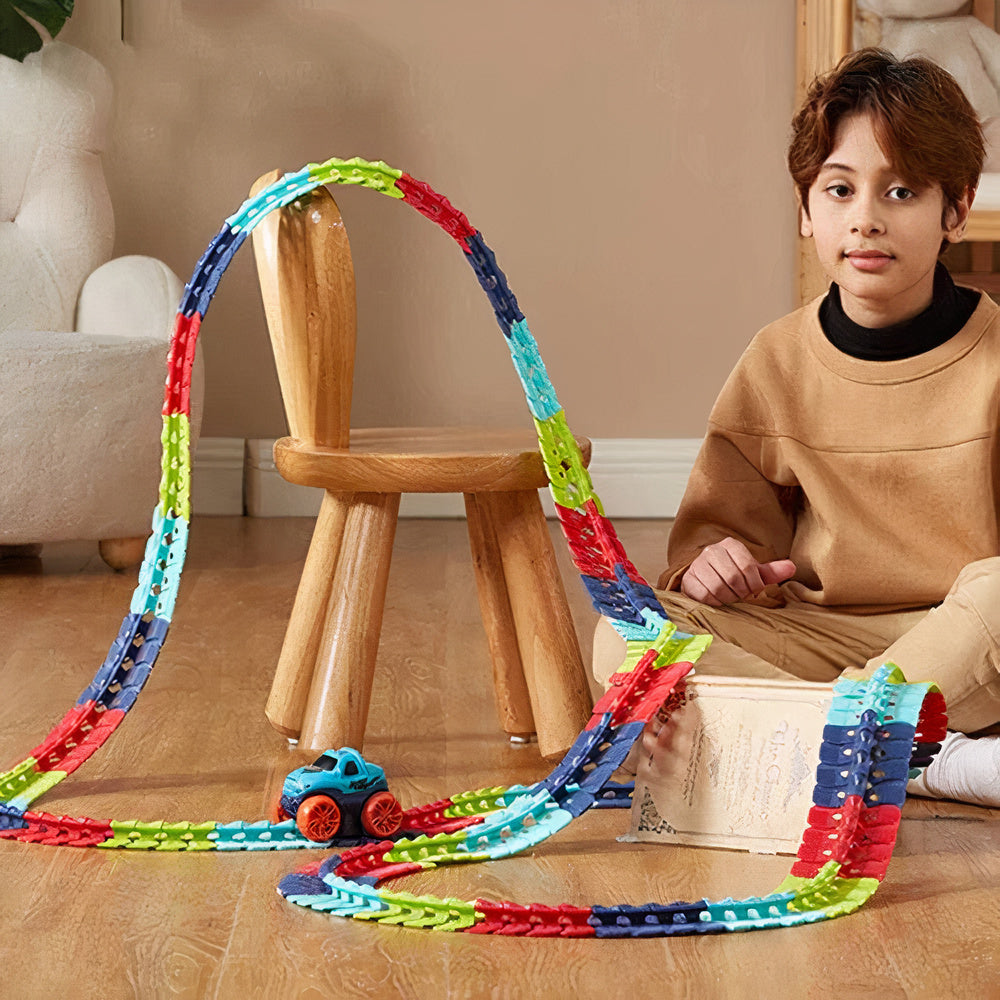 Flexible track toy for kids ages 3 and up with glowing race car
