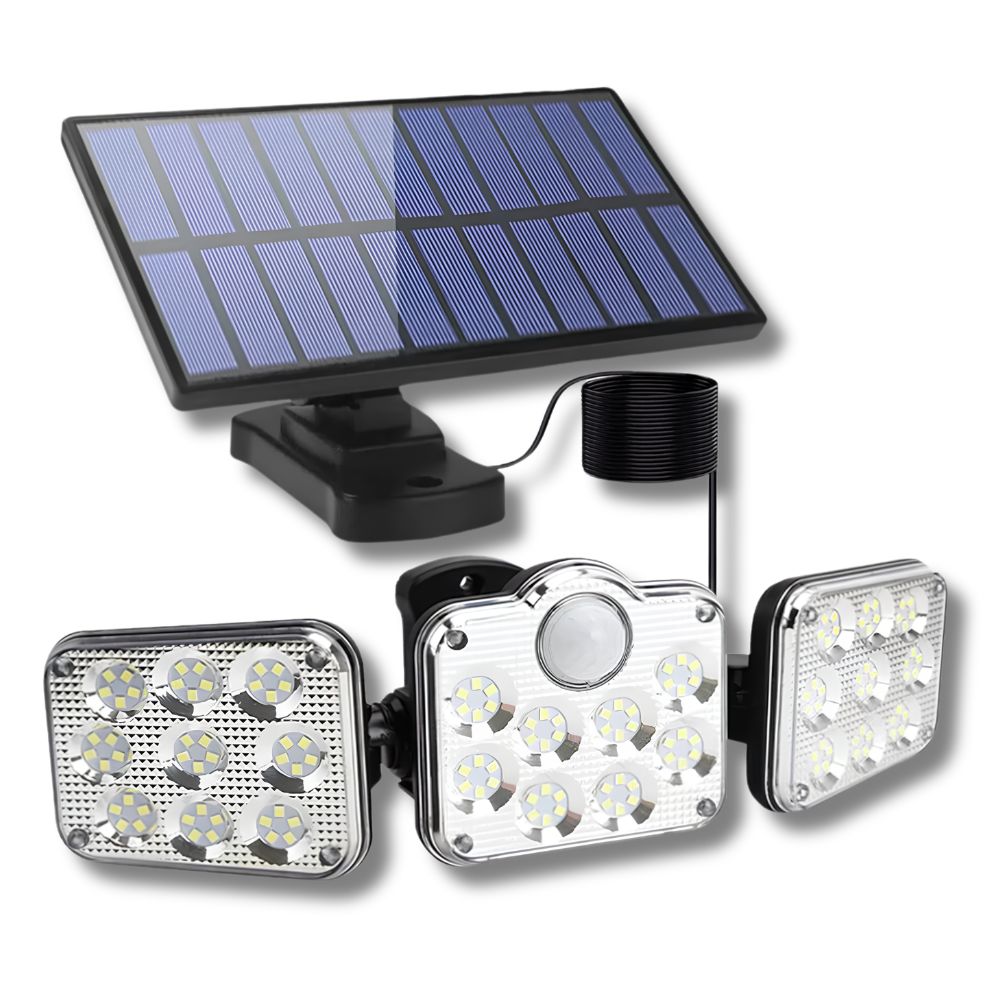 Solar motion sensor light outdoor illuminating driveway at night automatically