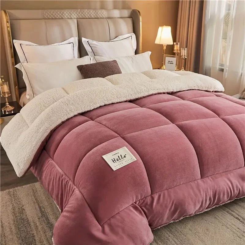 Pink comforter with a label on a bed in a bedroom setting