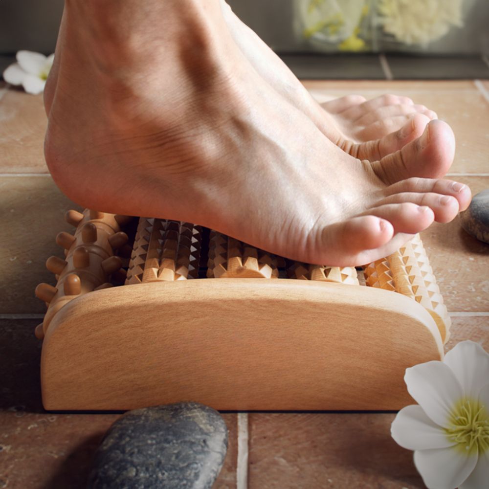Non-slip wooden foot massager for under-desk relaxation

