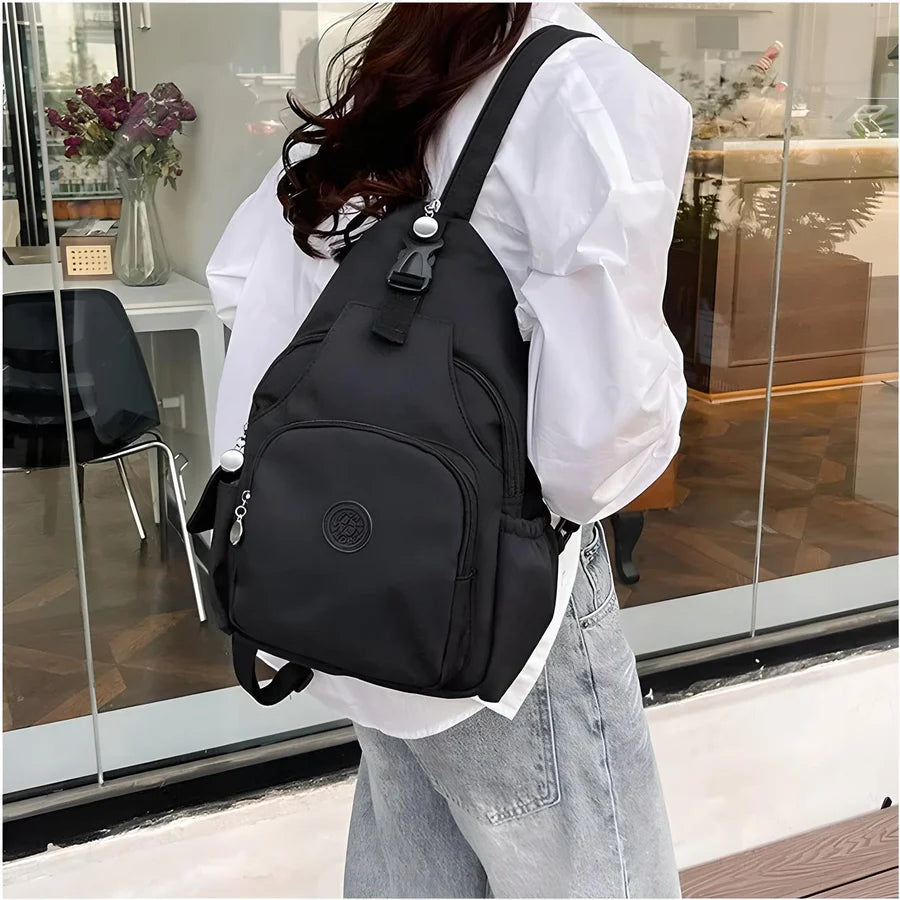 Anti-theft travel crossbody bag with hidden pockets and adjustable strap