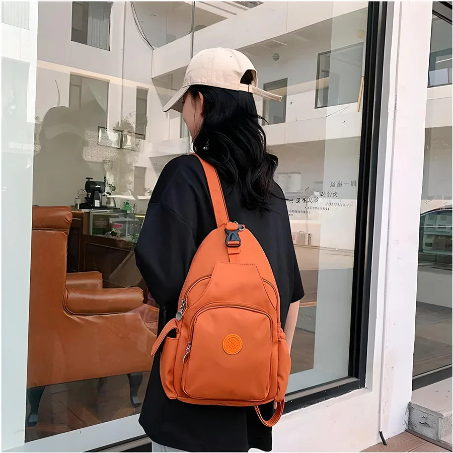 Lightweight convertible travel bag worn as a crossbody or shoulder bag