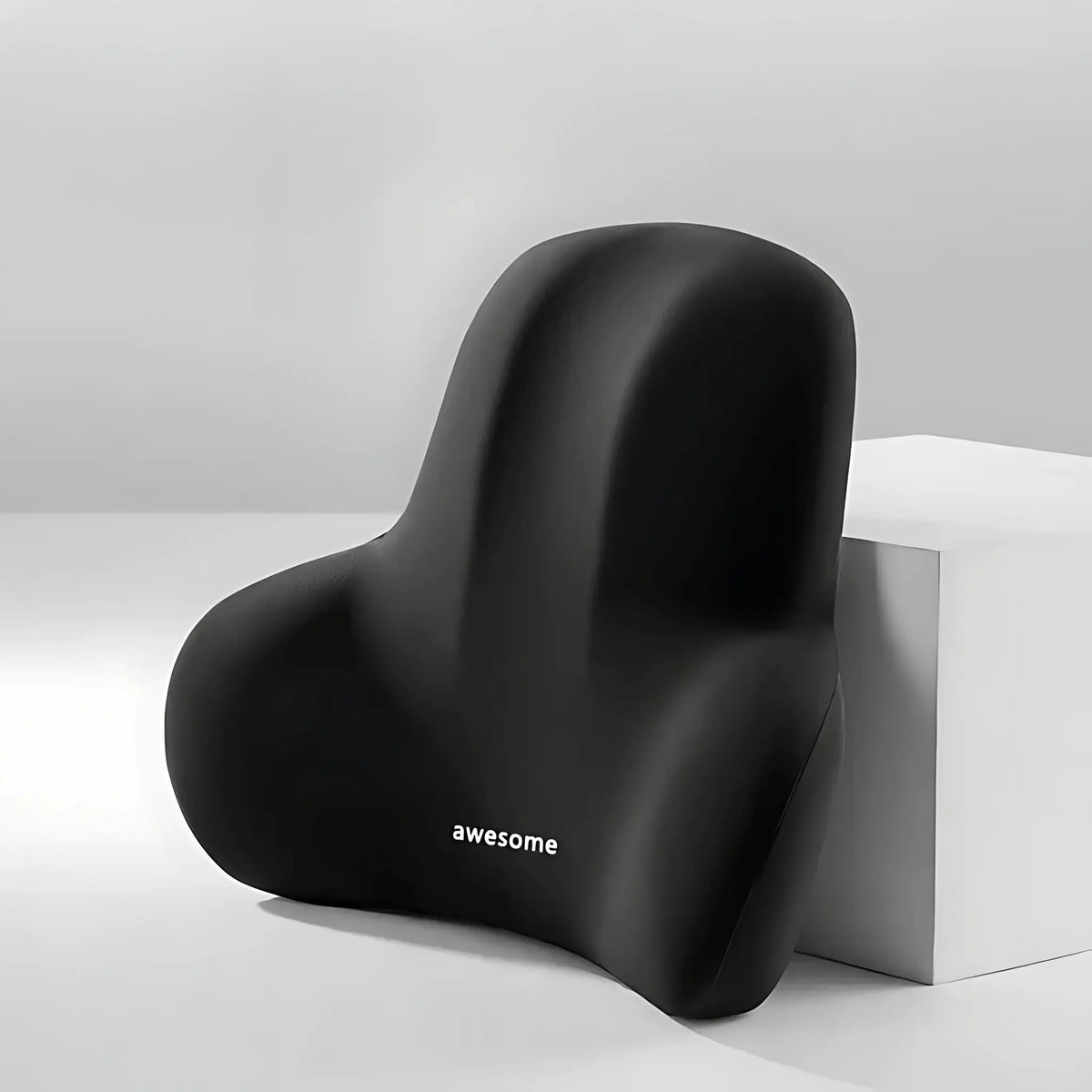LumbarPro cushion with removable cover unzipped showing memory foam core inside