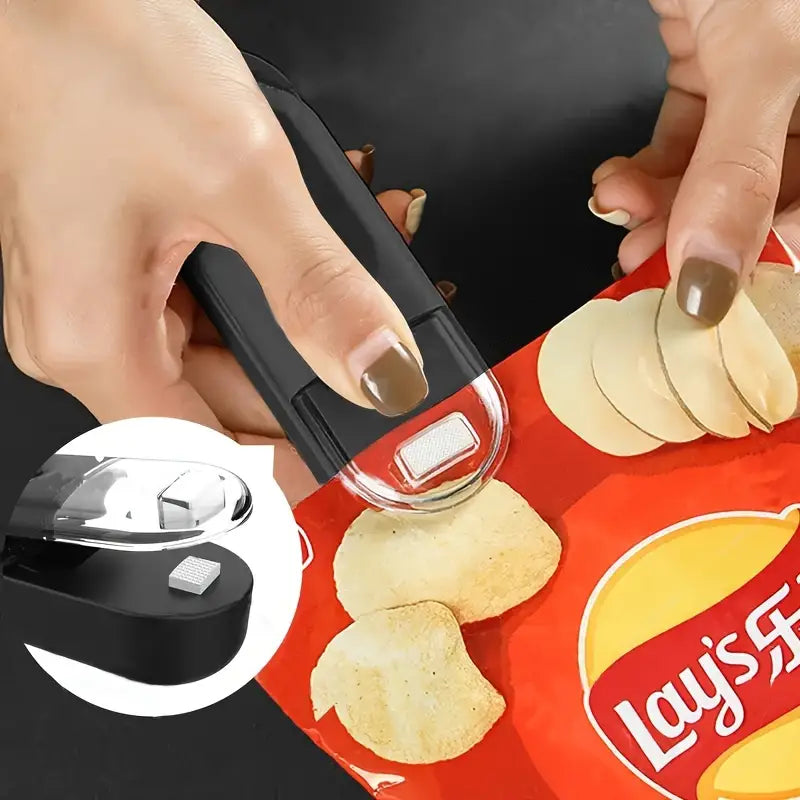 Fridge-mounted mini snack sealer with magnetic back

