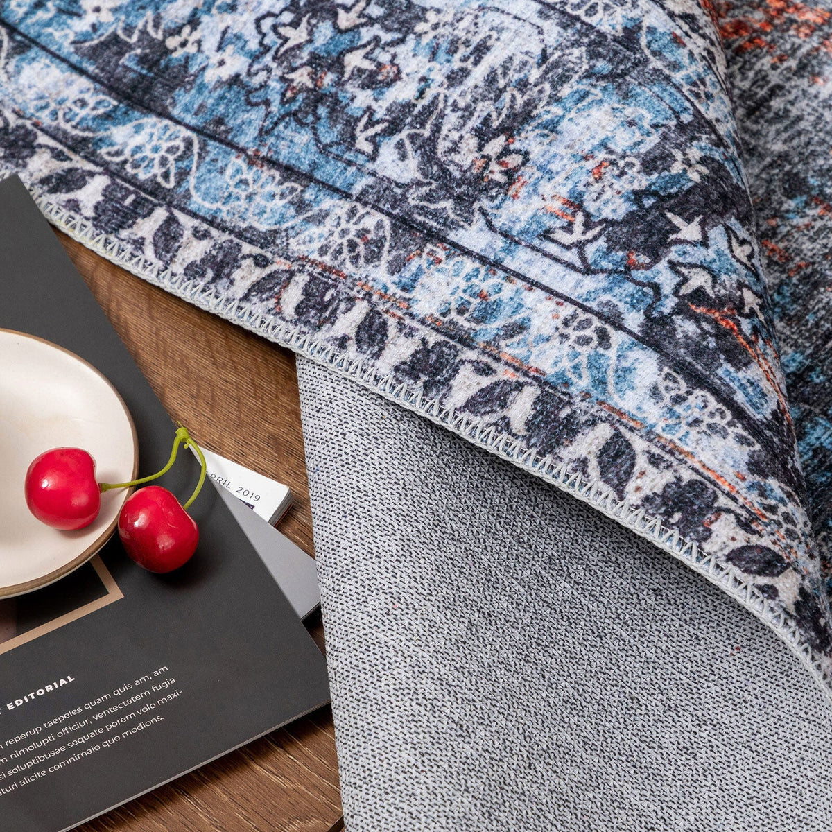 Plush washable rug with spill-resistant surface

